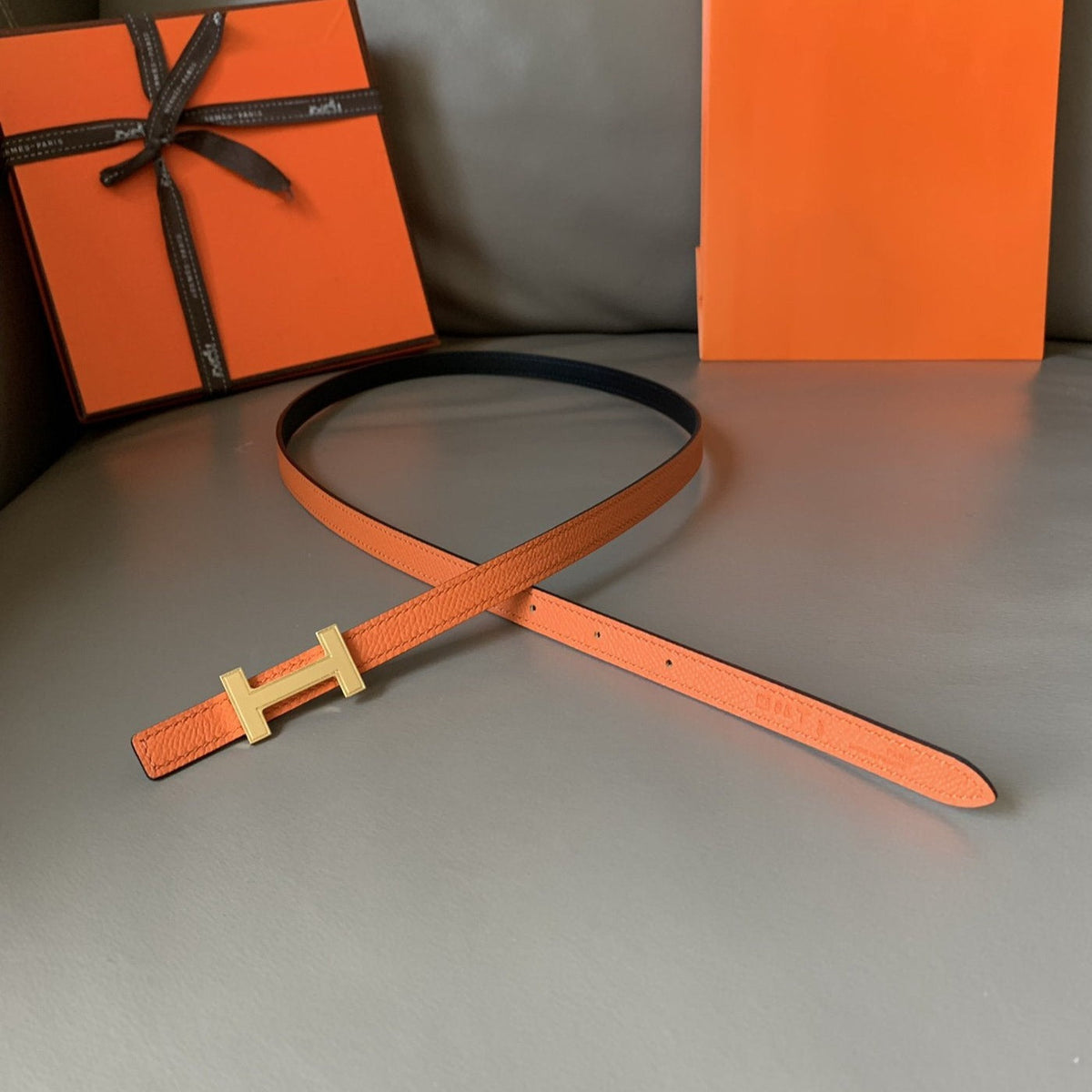 FOCUS BELT GOLD BUCKLE ORANGE AND BLACK REVERSIBLE LEATHER 1.3CM.