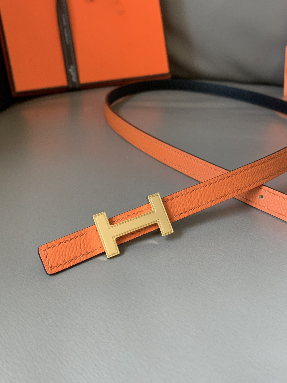 FOCUS BELT GOLD BUCKLE ORANGE AND BLACK REVERSIBLE LEATHER 1.3CM.