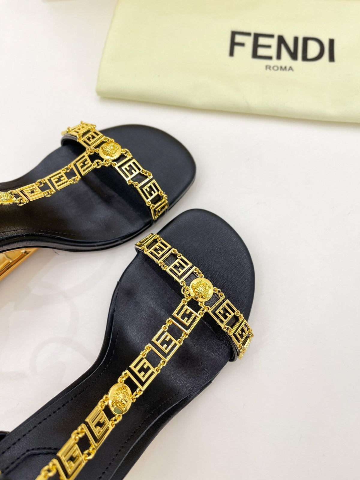 FENDI HIGH-HEELED 85 MM SANDALS IN BLACK LAMBSKIN WITH GOLD HARDWARE