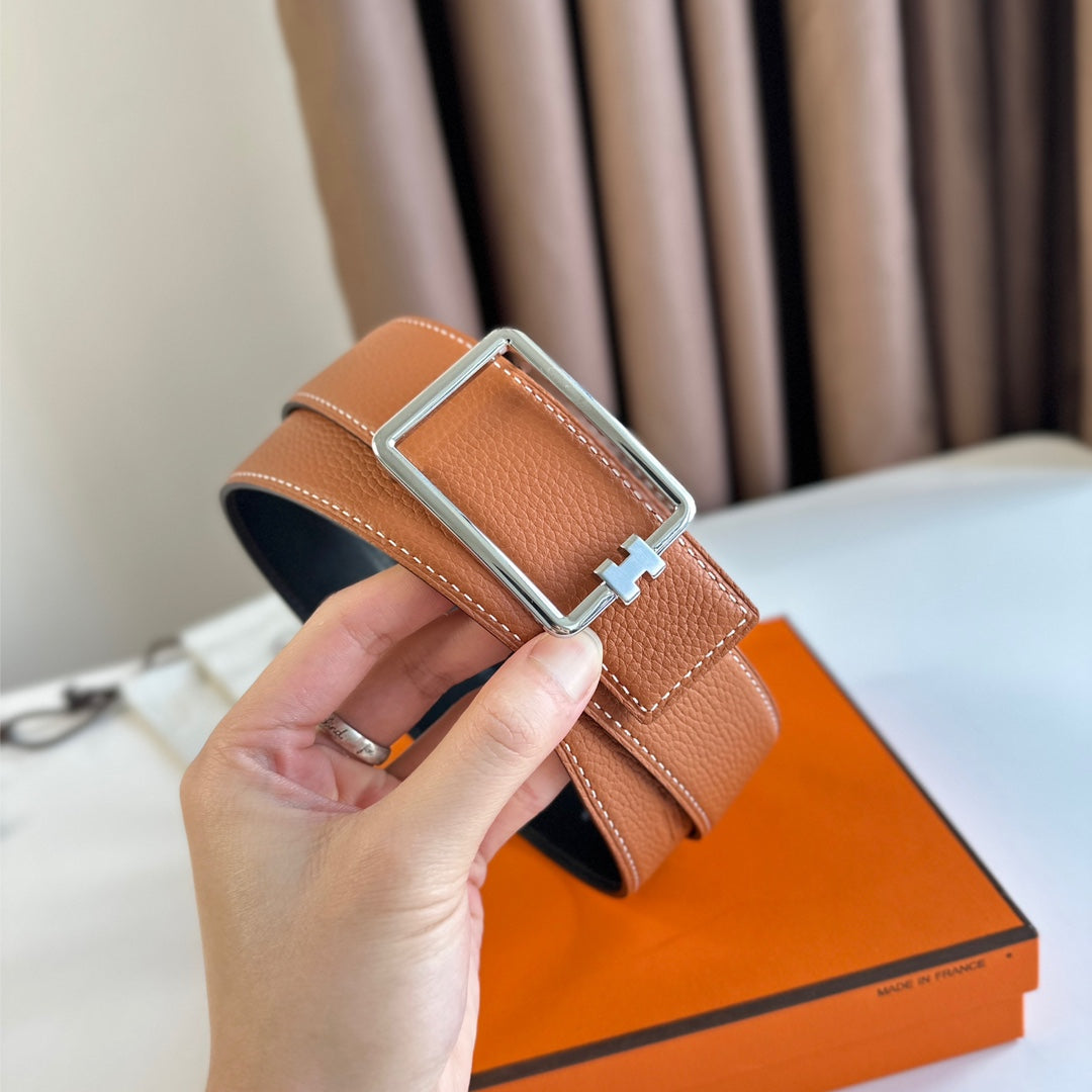 HM TUBE H BELT BUCKLE & REVERSIBLE BLACK AND YAM ORANGE LEATHER STRAP 38MM SILVER HARDWARE