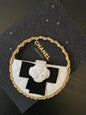 Chanel 2026 Quilted Round Camellia Mini Clutch 16cm Lambskin