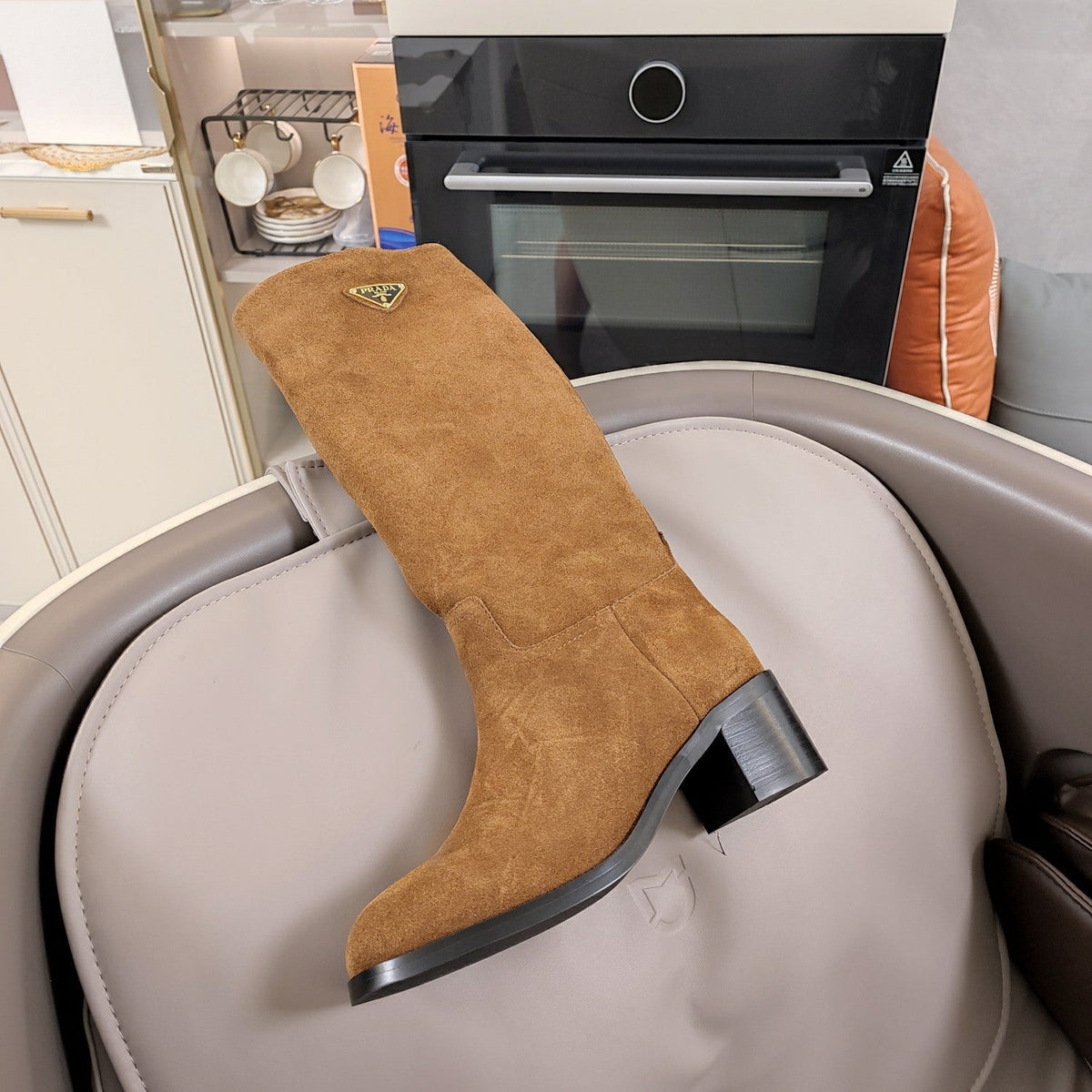 KNEE BOOTS WITH TRIANGLE LOGO IN CAMEL SUEDE
