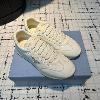 PRA TRIANGLE LOGO SNEAKERS WHITE CALFSKIN