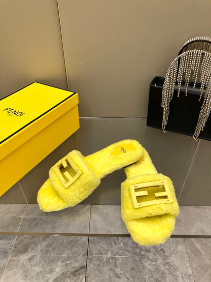 FENDI BAGUETTE SLIDE SLIPPERS IN BRIGHT YELLOW WOOL